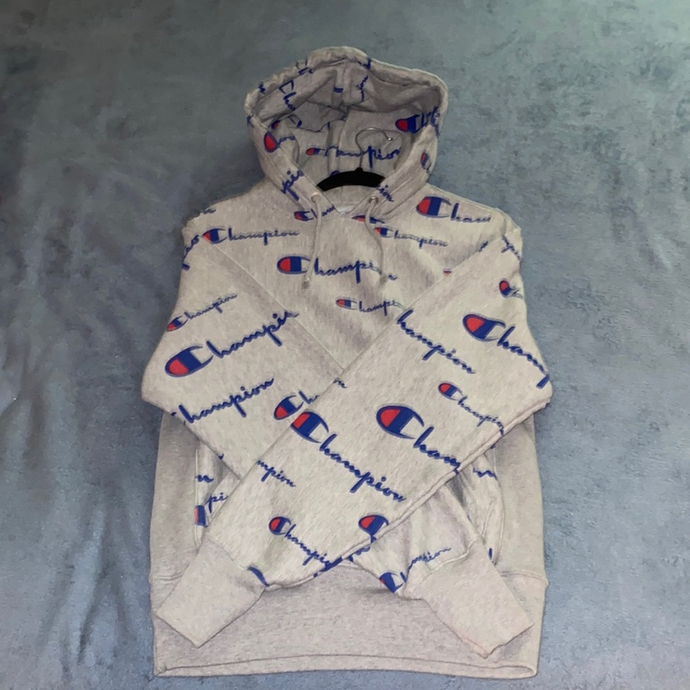 Almost new Champion Reverse Weave All Over Logo Pullover Hoodie. Size small.